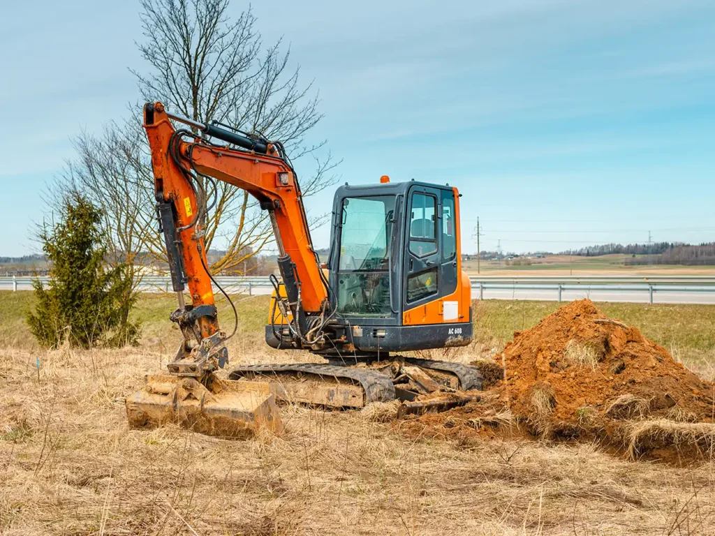Výmena gumového pásu na minibagre